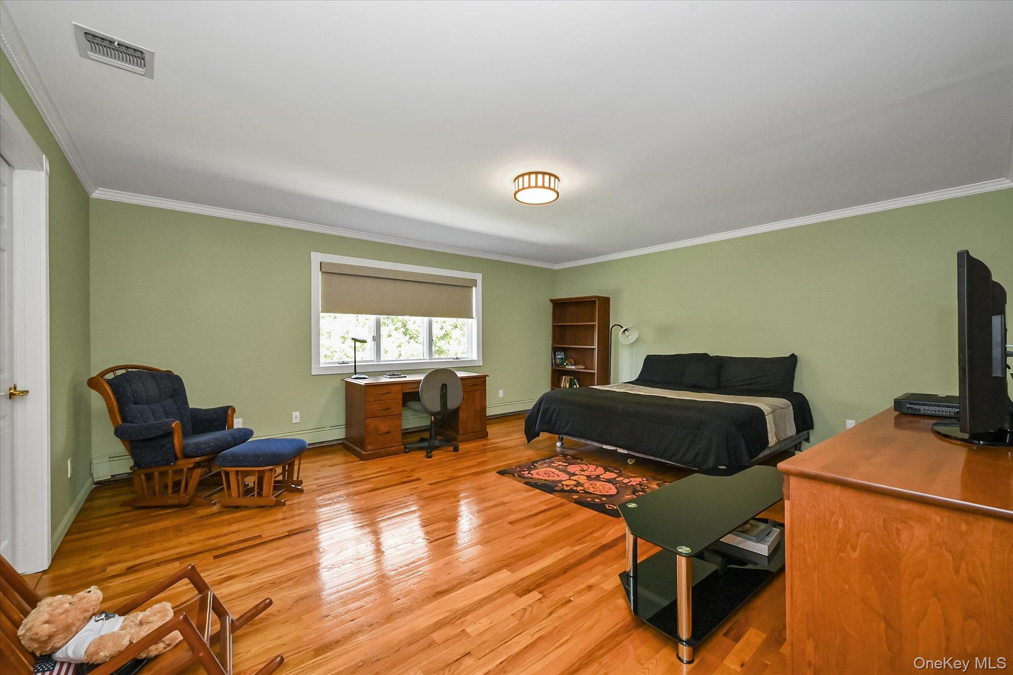 85 Meadow Woods Road Great Neck, NY 11020 - Photo 16 of 25 Bedroom 2 shares a bathroom with Bedroom 3 and comes complete with a walk-in closet.