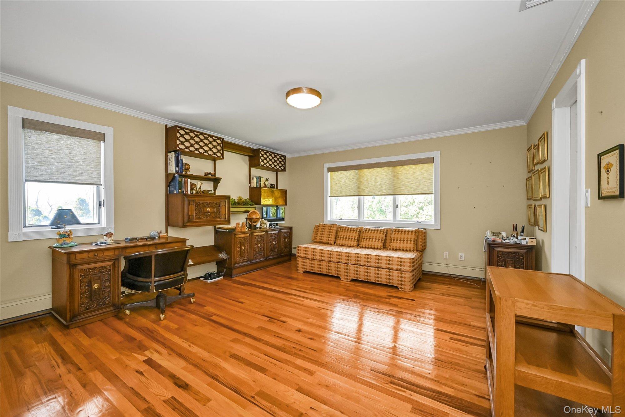 85 Meadow Woods Road Great Neck, NY 11020 - Photo 18 of 25 Bedroom #3 shares a bathroom with Bedroom #2 and also features its own walk-in closet.