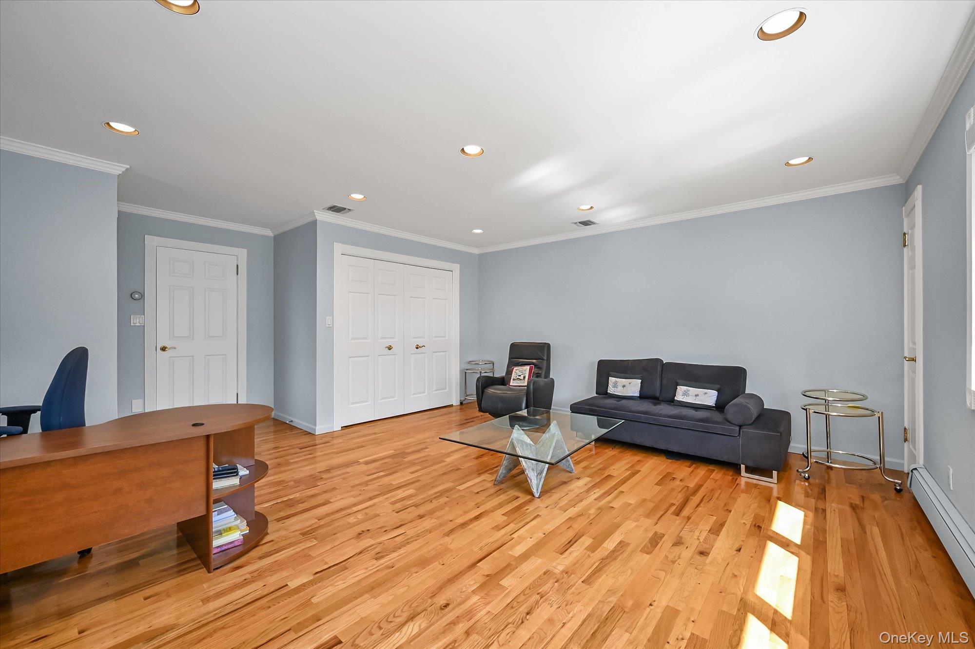 85 Meadow Woods Road Great Neck, NY 11020 - Photo 19 of 25 Bedroom #4 features an ensuite bathroom, two double closets, and an additional walk-in closet.