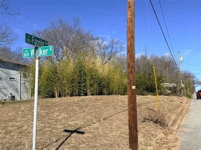 a view of a yard covered in snow