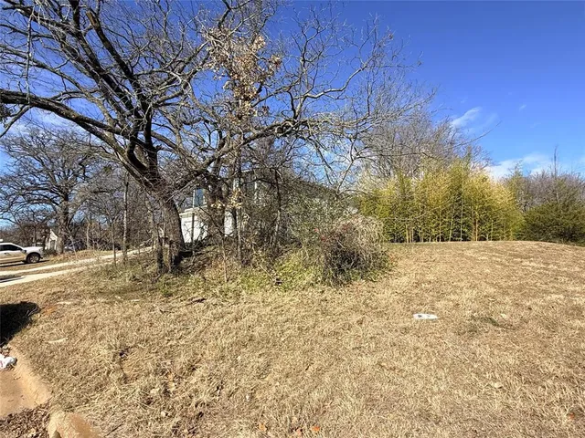 a view of a yard covered in snow