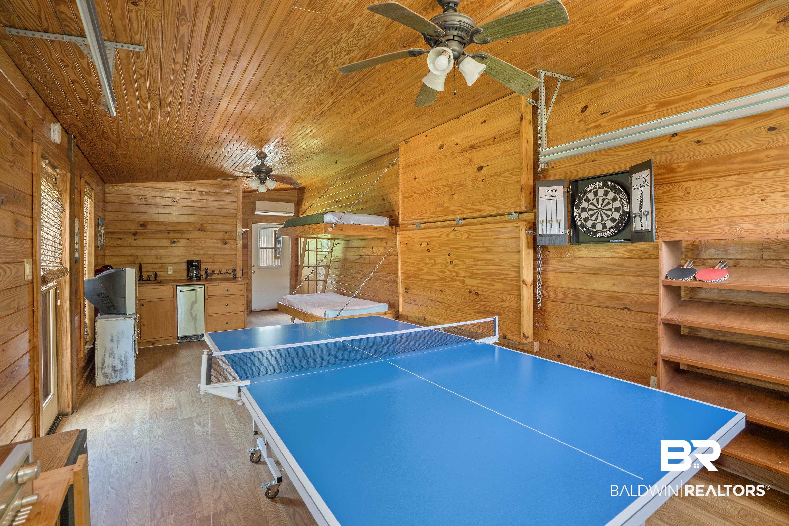 13253 Mary Ann Bch Road Fairhope, AL 36532 - Photo 36 of 54 Playroom with wood-type flooring, wooden ceiling, wooden walls, and ceiling fan