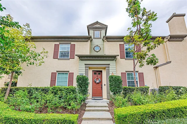 front view of a house with a small yard