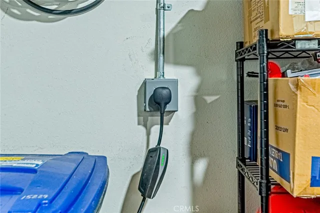 a view of a hallway with furniture