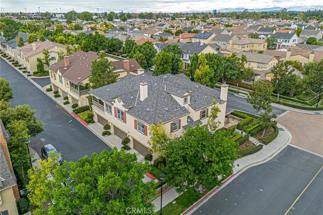 an aerial view of a house with a garden
