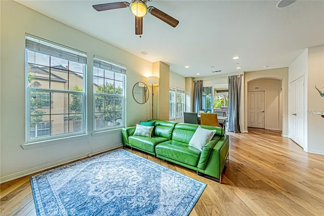 a living room with furniture and a rug