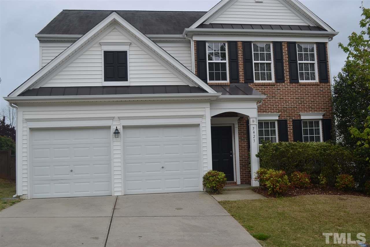 5423 Shaker Heights Lane Raleigh, NC 27613 - Photo 2 of 24 a front view of a house with garden