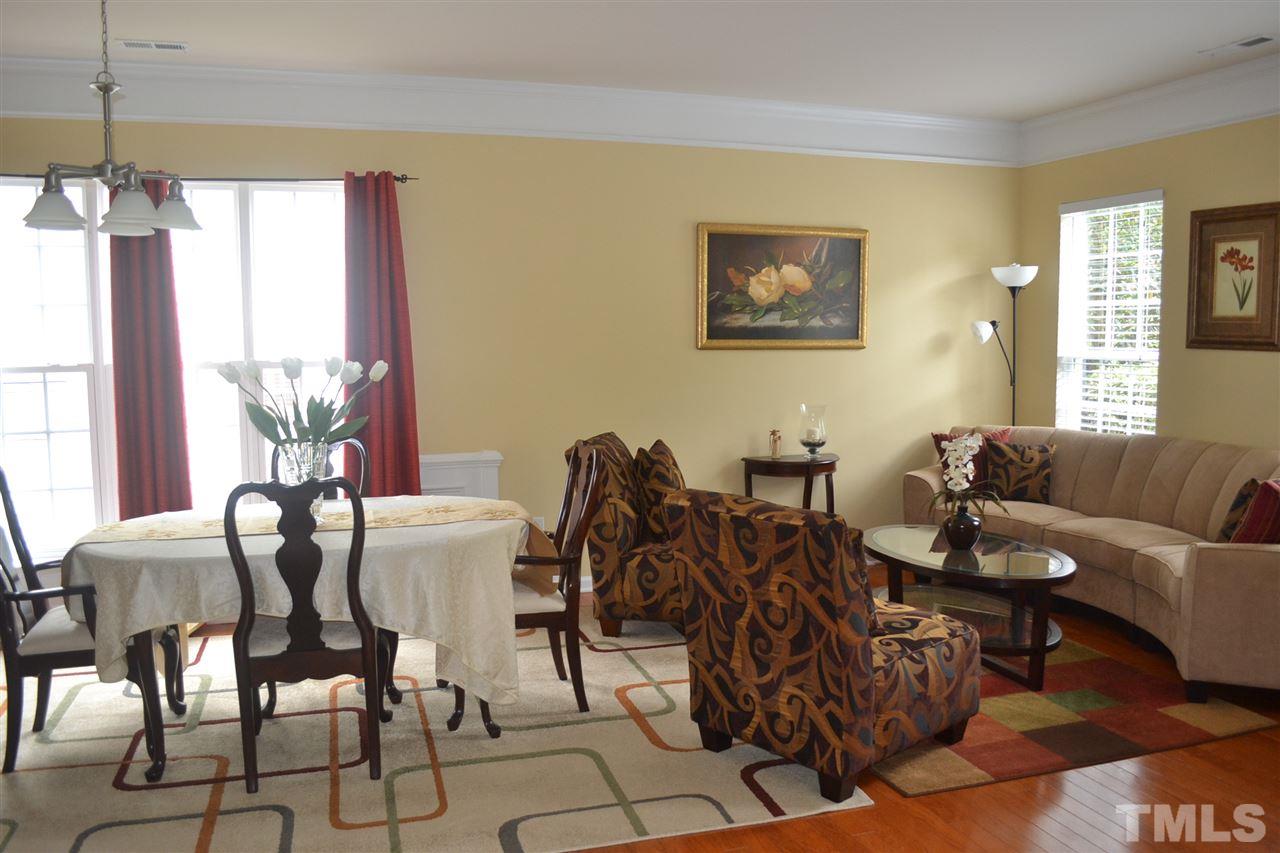 5423 Shaker Heights Lane Raleigh, NC 27613 - Photo 6 of 24 a view of a livingroom with furniture and window