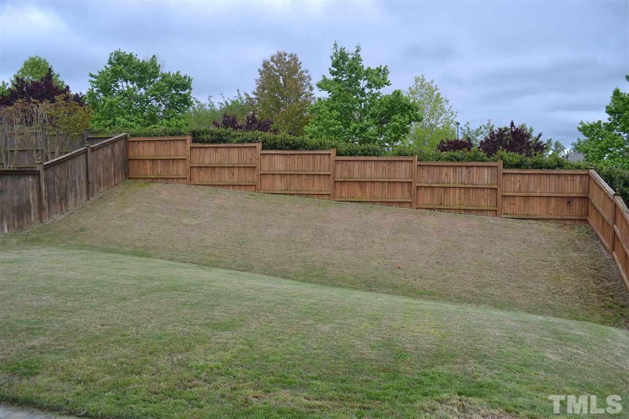 5423 Shaker Heights Lane Raleigh, NC 27613 - Photo 7 of 24 a view of a backyard