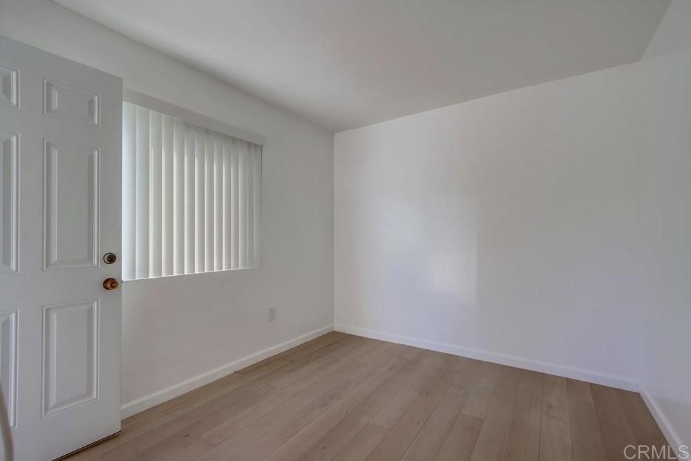 1376 Panorama Ridge Road Oceanside, CA 92056 - Photo 17 of 50 an empty room with a window