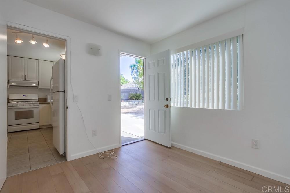 1376 Panorama Ridge Road Oceanside, CA 92056 - Photo 19 of 50 a view of a kitchen with wooden floor and a sink