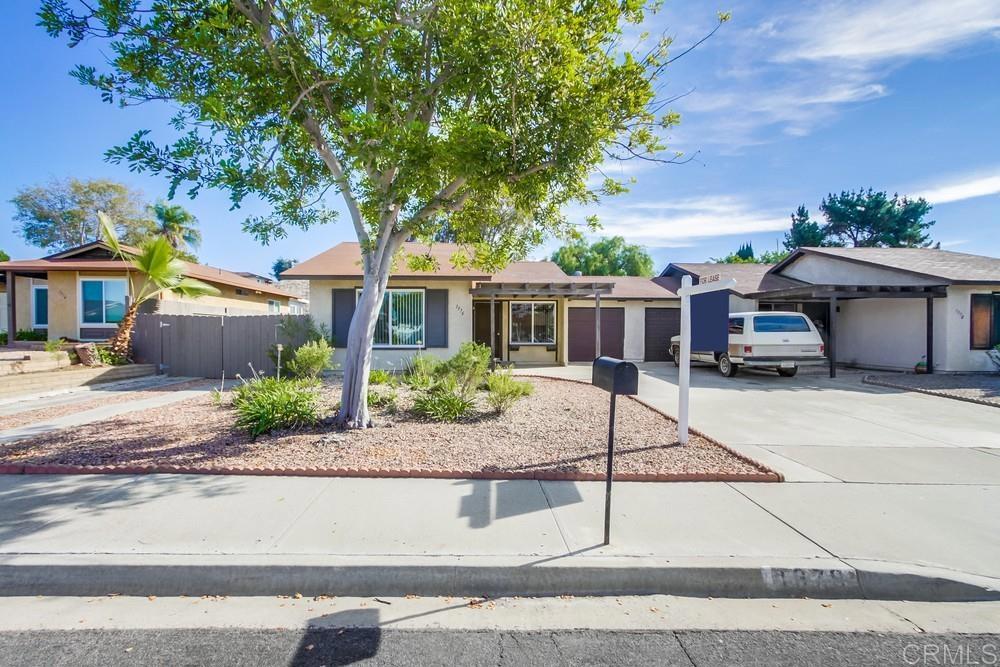 1376 Panorama Ridge Road Oceanside, CA 92056 - Photo 2 of 50 front view of a house with a tree