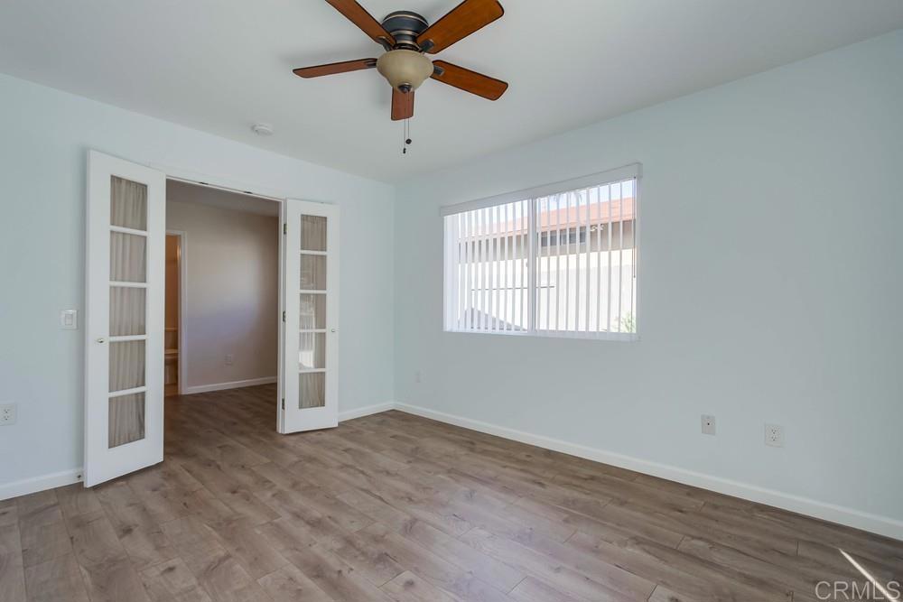 1376 Panorama Ridge Road Oceanside, CA 92056 - Photo 30 of 50 an empty room with closet and windows