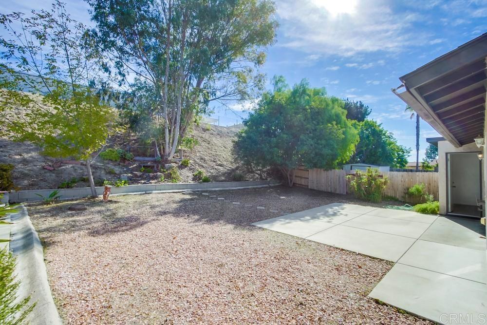1376 Panorama Ridge Road Oceanside, CA 92056 - Photo 40 of 50 a backyard of a house with lots of green space
