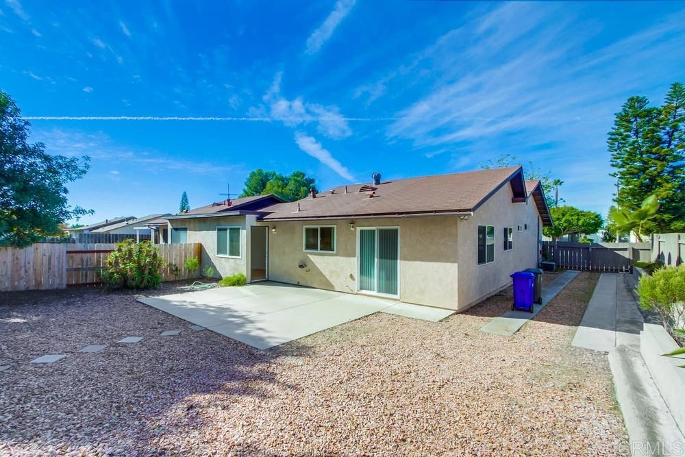 1376 Panorama Ridge Road Oceanside, CA 92056 - Photo 42 of 50 a front view of a house with a yard
