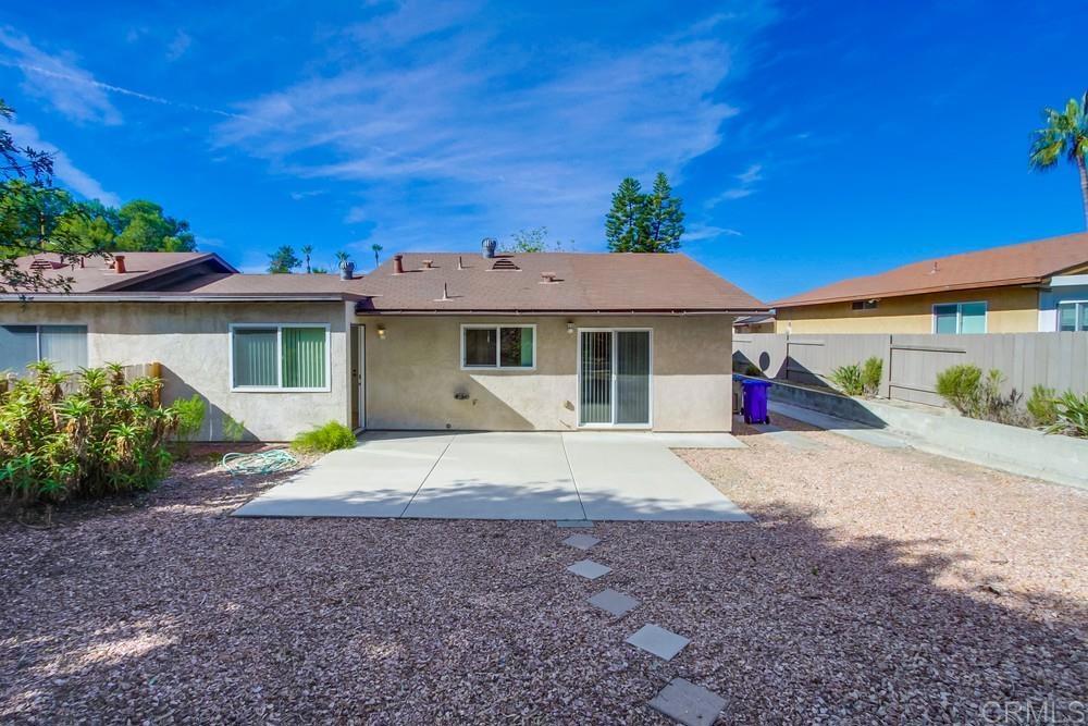 1376 Panorama Ridge Road Oceanside, CA 92056 - Photo 43 of 50 a view of a house with a yard and potted plants