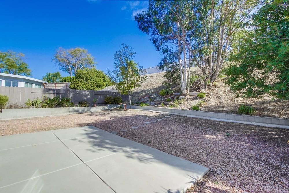 1376 Panorama Ridge Road Oceanside, CA 92056 - Photo 44 of 50 a view of a yard with plants and trees