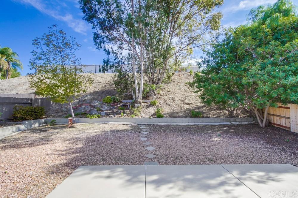 1376 Panorama Ridge Road Oceanside, CA 92056 - Photo 47 of 50 a backyard of a house with lots of green space