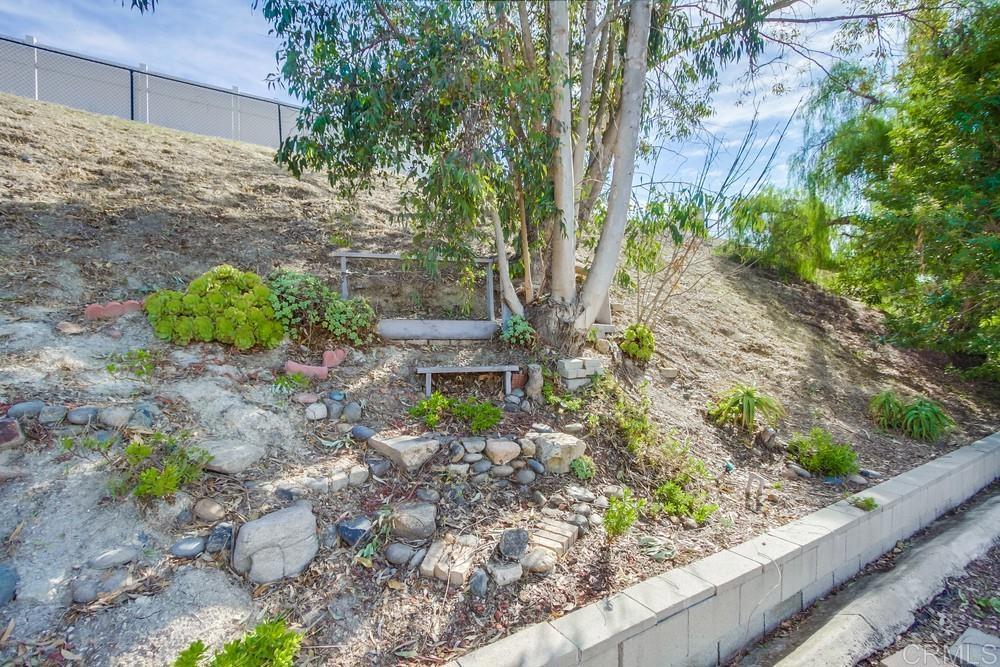 1376 Panorama Ridge Road Oceanside, CA 92056 - Photo 48 of 50 a garden view with a seating space