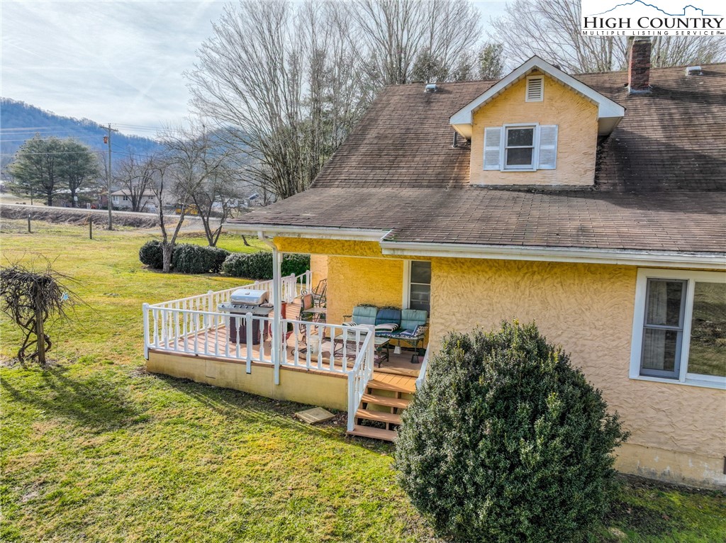 4634 Highway 421 Vilas, NC 28692 - Photo 12 of 28 a view of a house with swimming pool and sitting area