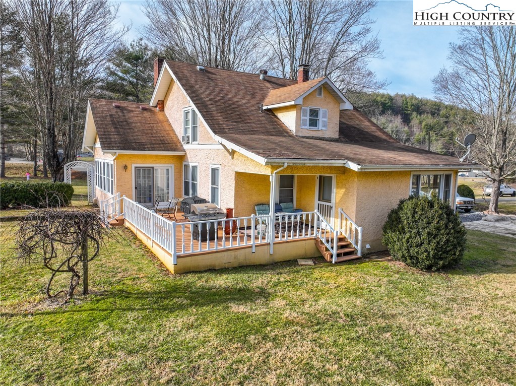 4634 Highway 421 Vilas, NC 28692 - Photo 13 of 28 a front view of a house with garden