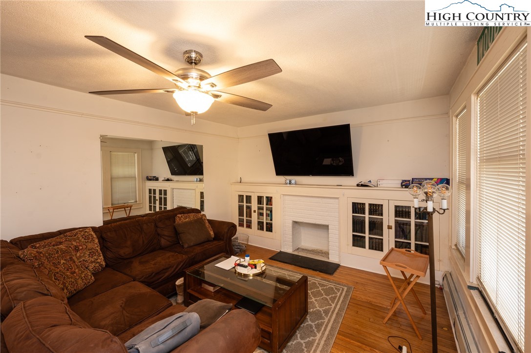 4634 Highway 421 Vilas, NC 28692 - Photo 15 of 28 a living room with furniture and a flat screen tv