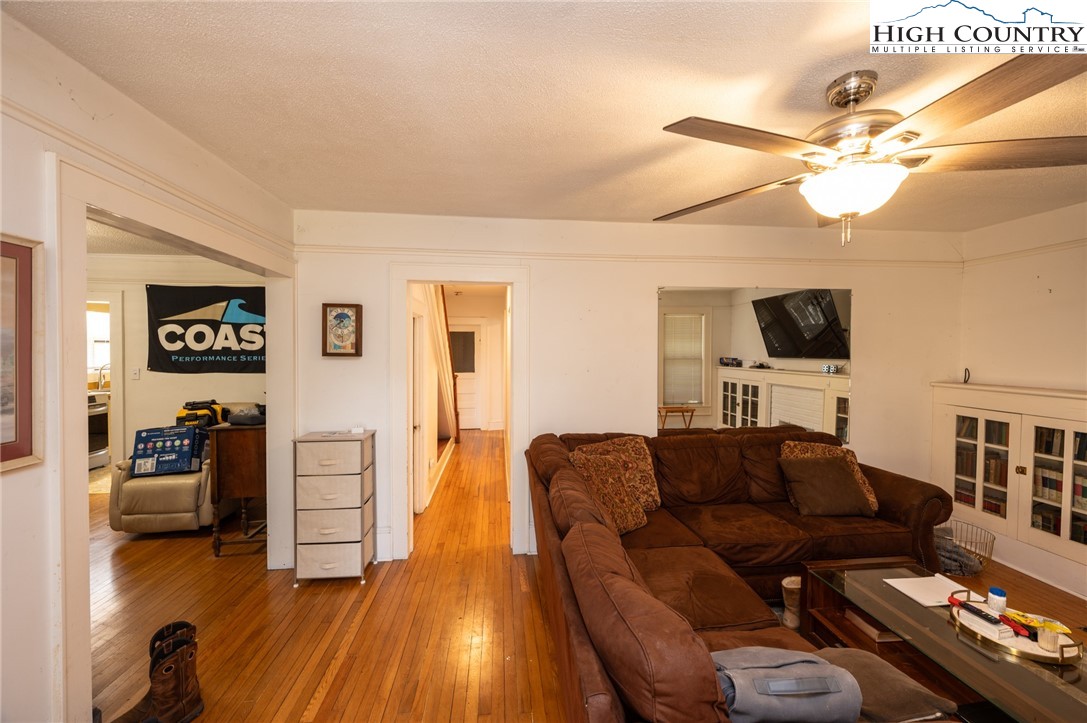 4634 Highway 421 Vilas, NC 28692 - Photo 16 of 28 a living room with furniture and a flat screen tv