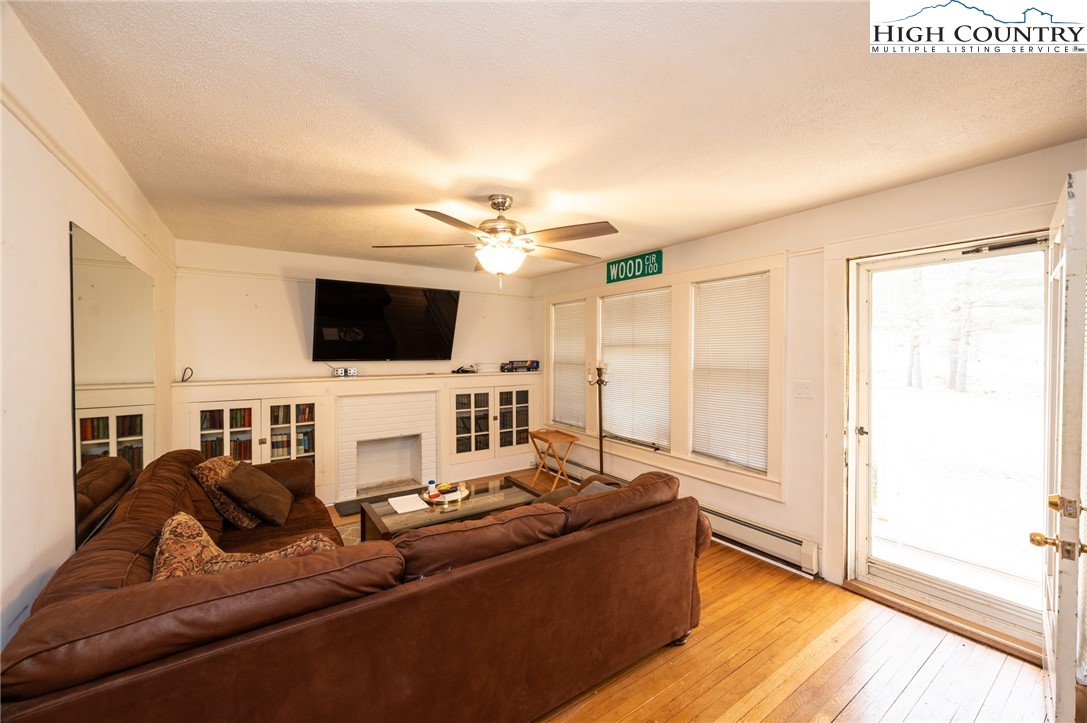 4634 Highway 421 Vilas, NC 28692 - Photo 17 of 28 a living room with furniture and a flat screen tv