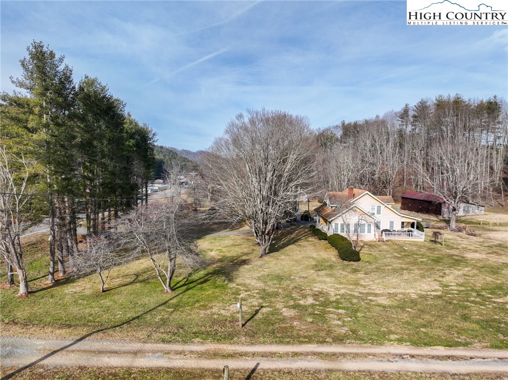 4634 Highway 421 Vilas, NC 28692 - Photo 5 of 28 a view of a house with a yard