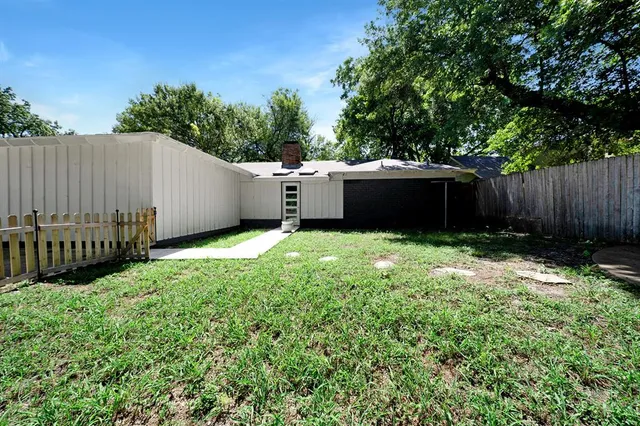 a house view with a outdoor space