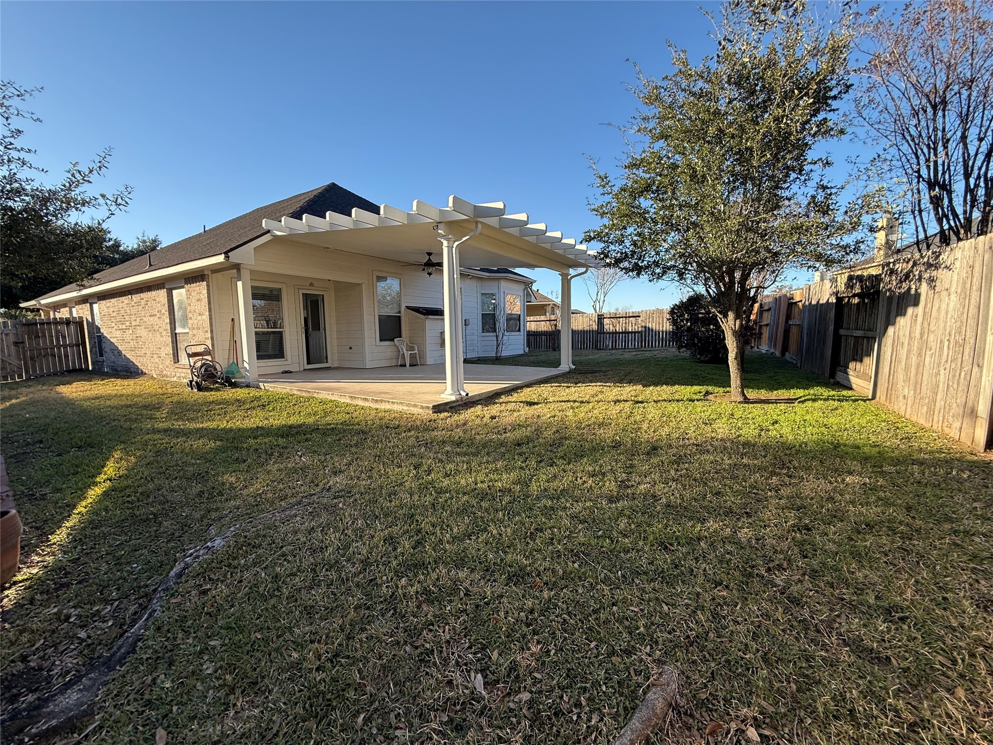 10002 Deer Track Court Houston, TX 77064 - Photo 15 of 15 a front view of a house with a yard