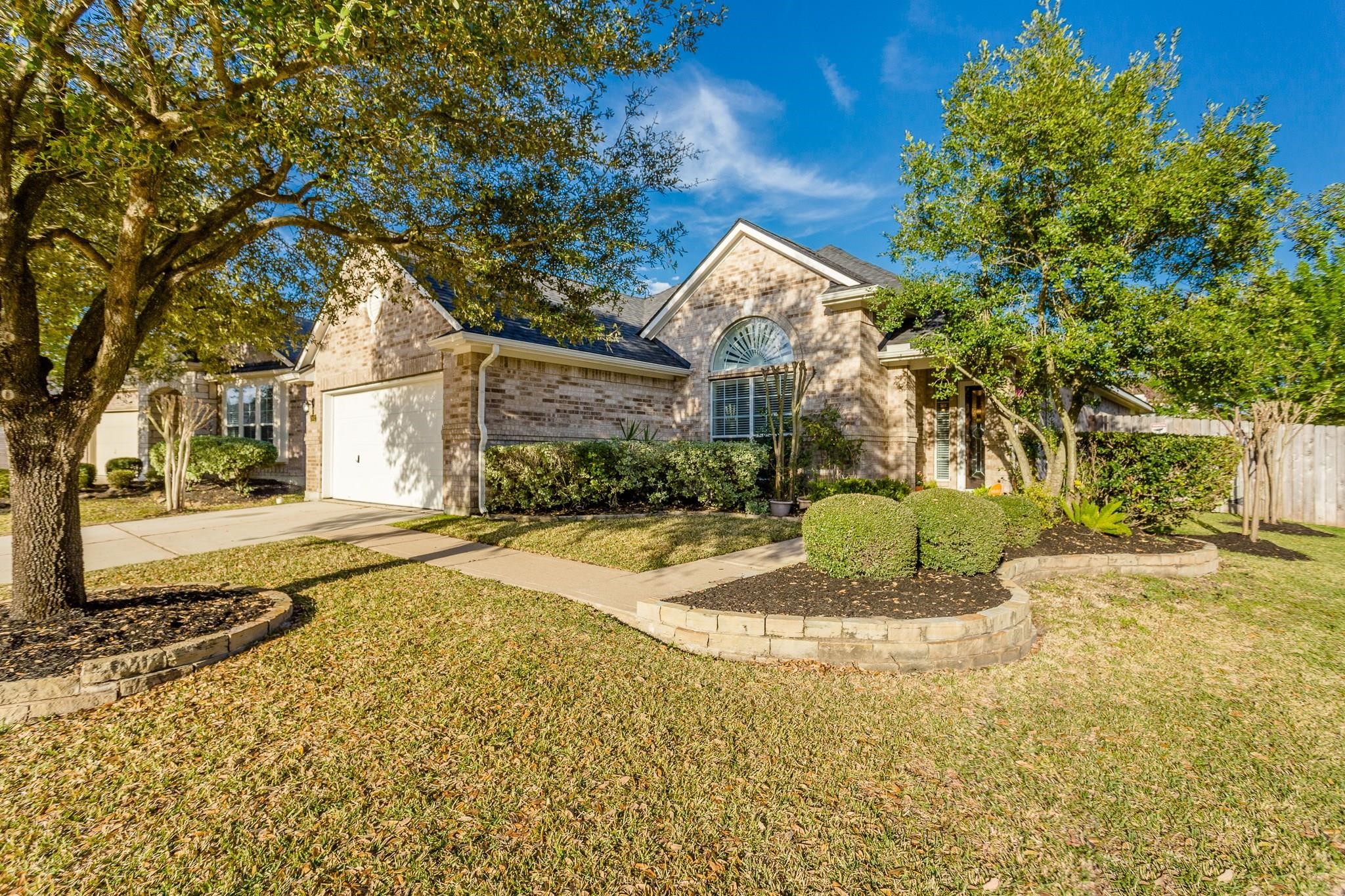 10002 Deer Track Court Houston, TX 77064 - Photo 2 of 15 a view of a house with snow on the background