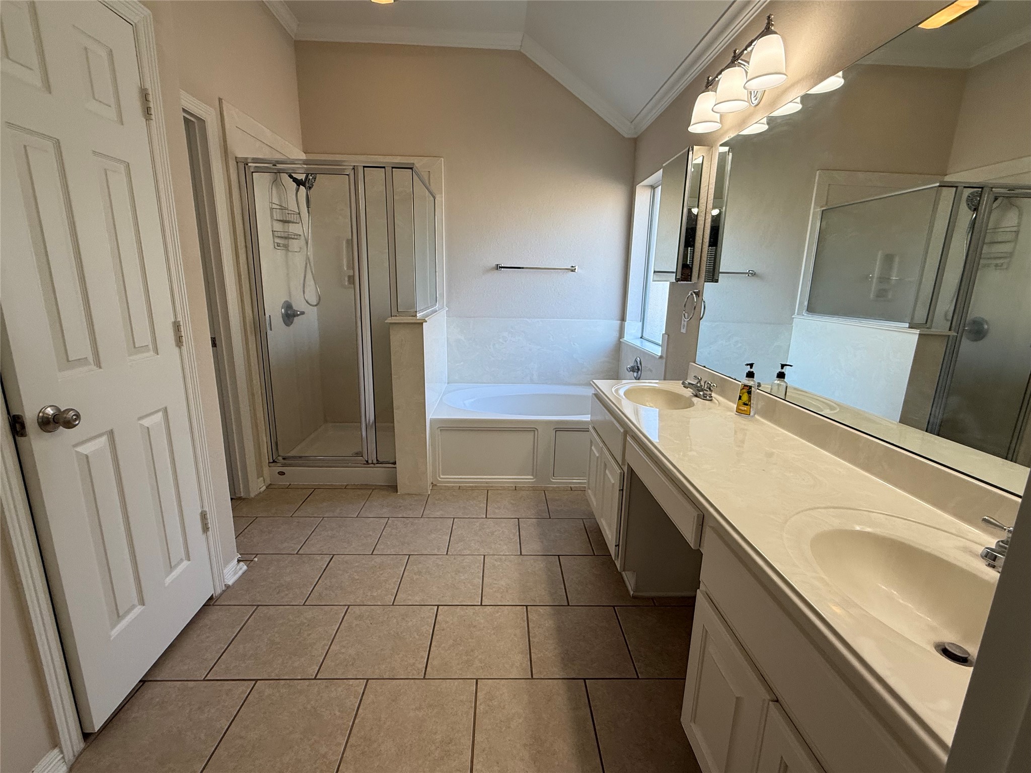 10002 Deer Track Court Houston, TX 77064 - Photo 8 of 15 a bathroom with a sink a toilet and a mirror