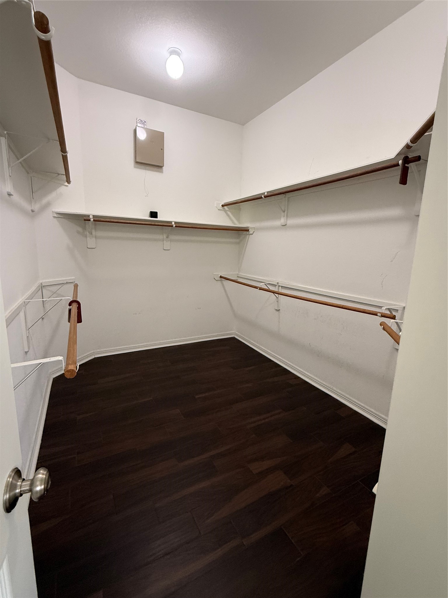 10002 Deer Track Court Houston, TX 77064 - Photo 9 of 15 a view of storage and utility room with empty racks