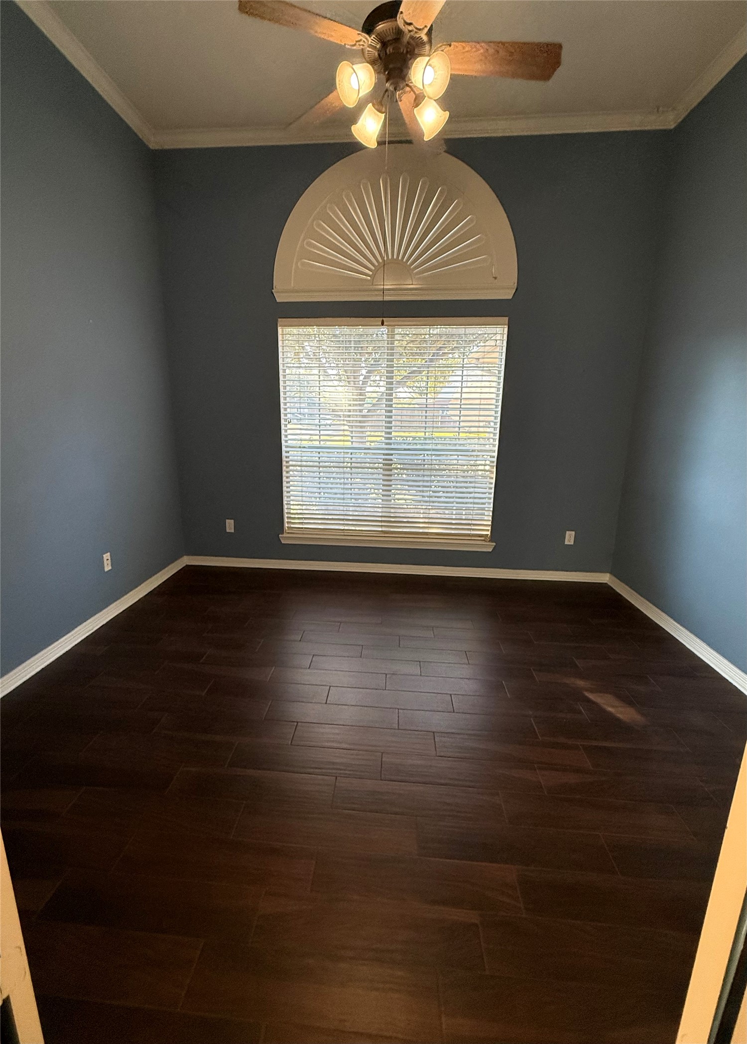 10002 Deer Track Court Houston, TX 77064 - Photo 10 of 15 a view of wooden floor and windows in a room