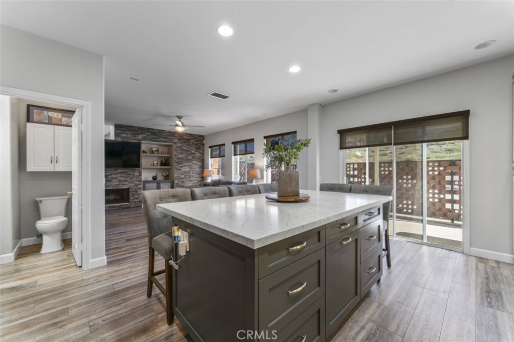 28340 Sycamore Drive Saugus, CA 91350 - Photo 11 of 34 a kitchen with counter top space and wooden floor