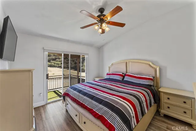 a bedroom with bed and a window