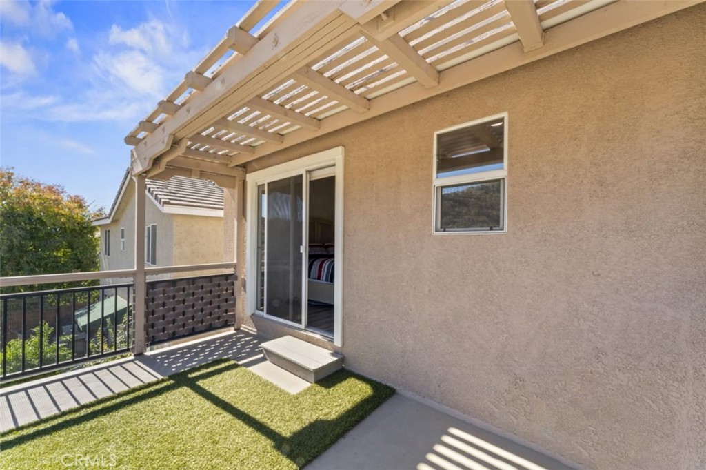 28340 Sycamore Drive Saugus, CA 91350 - Photo 14 of 34 a view of a balcony with wooden floor and fence
