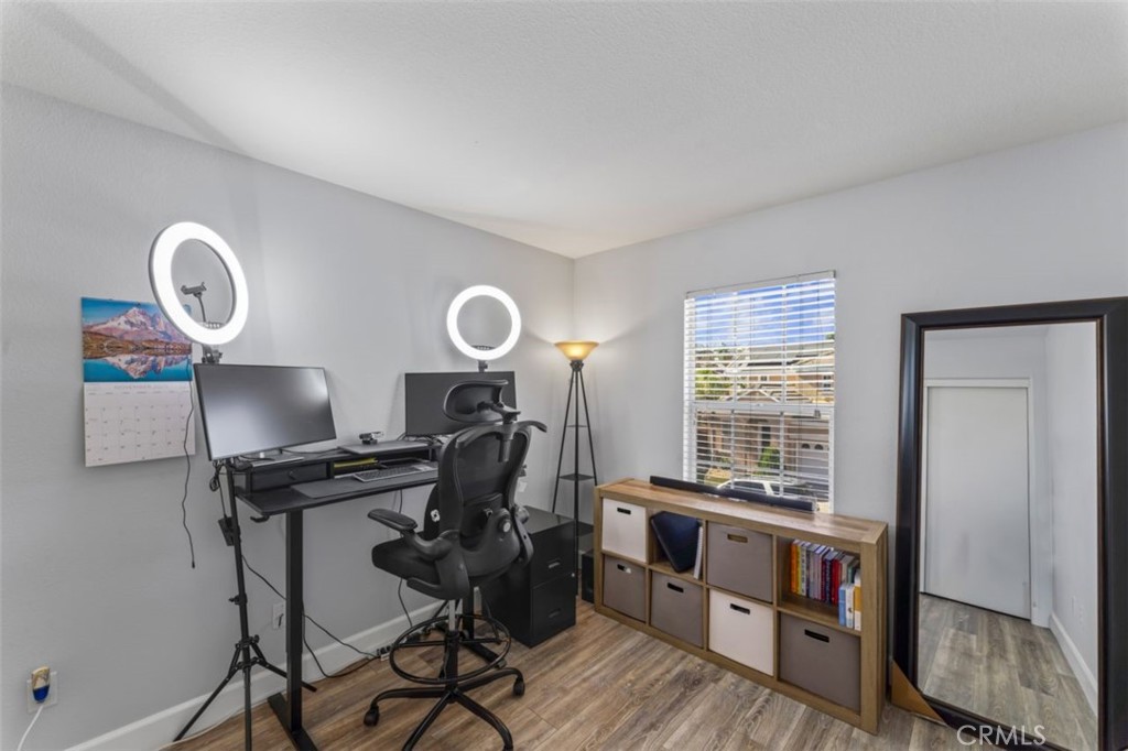 28340 Sycamore Drive Saugus, CA 91350 - Photo 22 of 34 a view of a workspace with furniture and a window