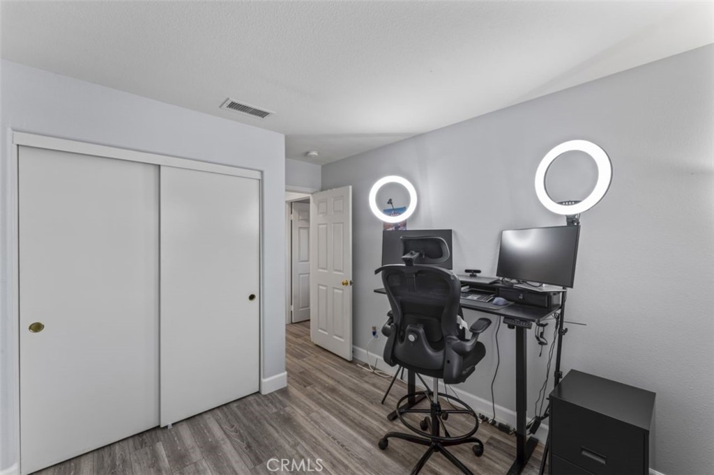 28340 Sycamore Drive Saugus, CA 91350 - Photo 23 of 34 a view of a workspace with furniture and wooden floor
