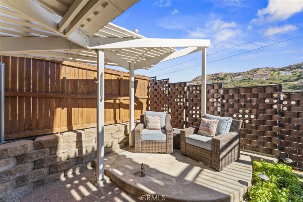 28340 Sycamore Drive Saugus, CA 91350 - Photo 29 of 34 a outdoor living space with patio furniture and a potted plant