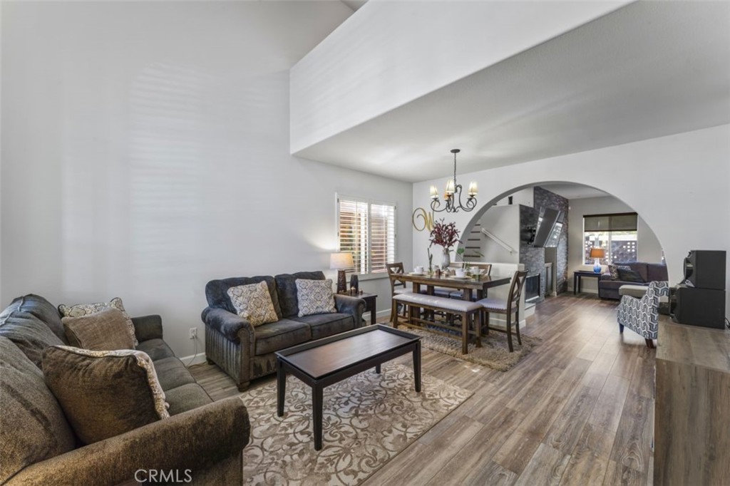28340 Sycamore Drive Saugus, CA 91350 - Photo 5 of 34 a living room with furniture and a chandelier