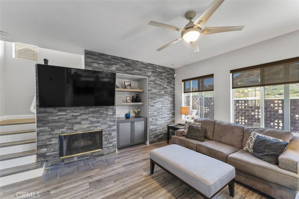 28340 Sycamore Drive Saugus, CA 91350 - Photo 6 of 34 a living room with furniture fireplace and flat screen tv