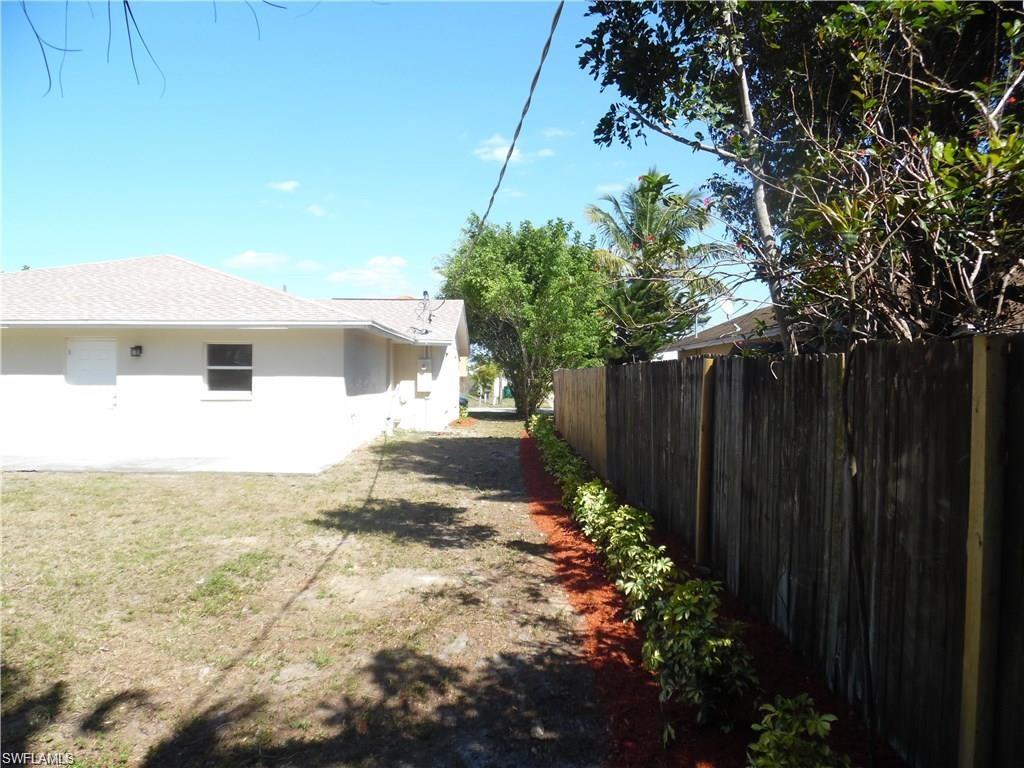 3055 52nd Street Southwest Naples, FL 34116 - Photo 19 of 21 a view of a backyard