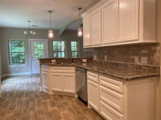 a bedroom with a bed and a closet