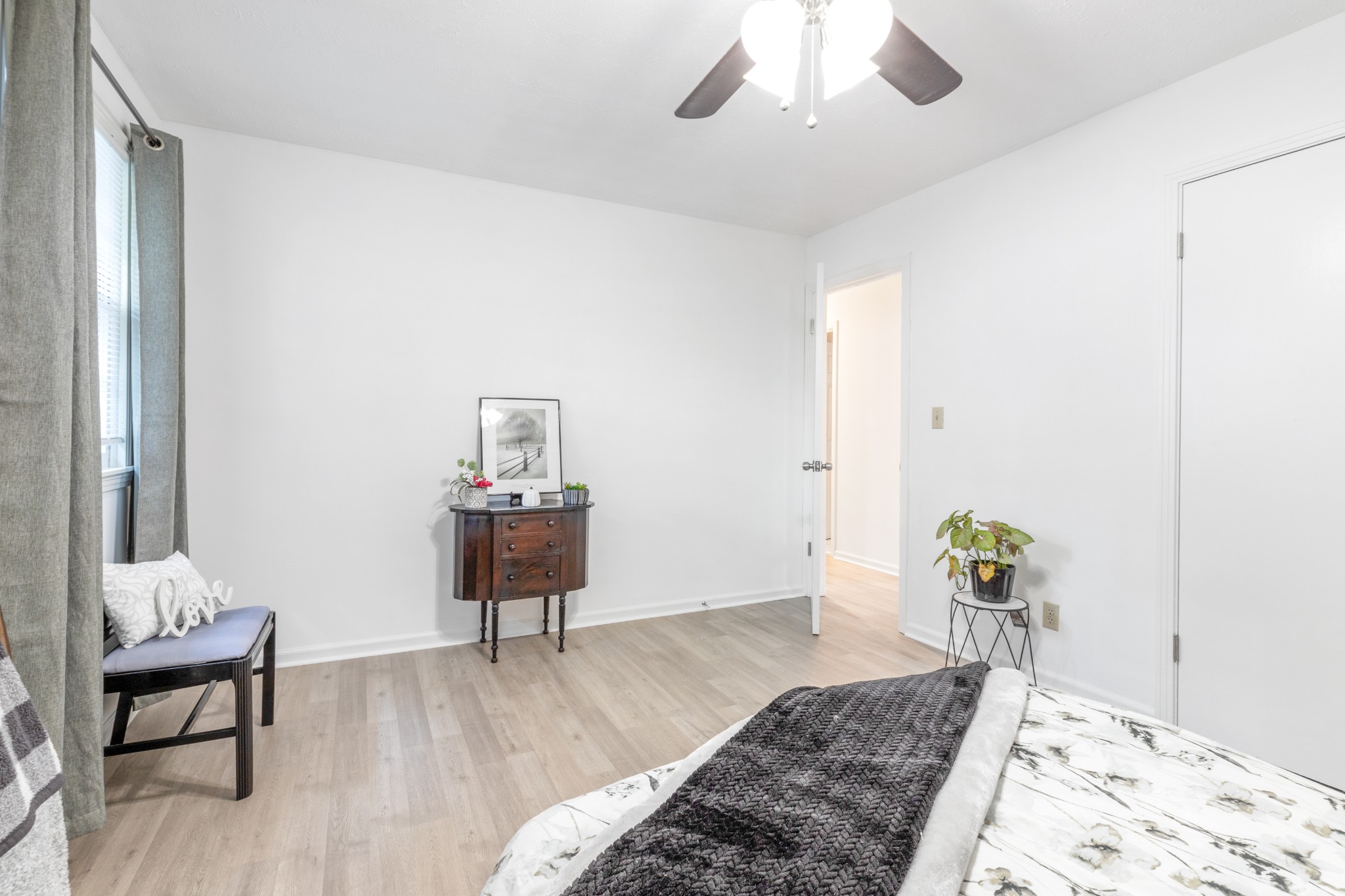 110 Nottingham Road Dickson, TN 37055 - Photo 24 of 34 a bedroom with a bed and wooden floor