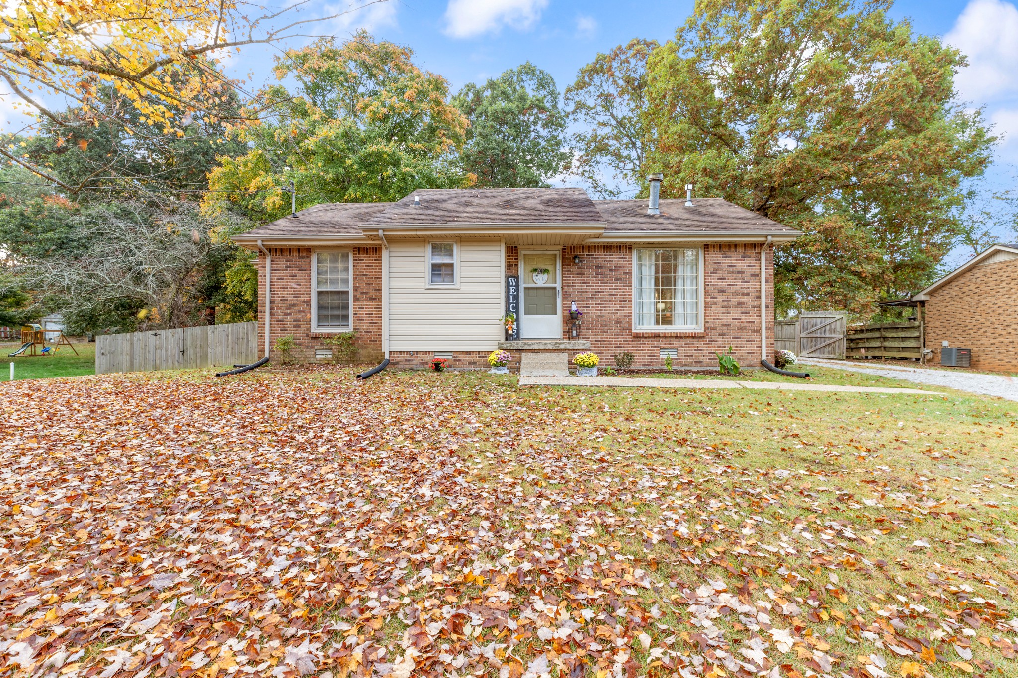 110 Nottingham Road Dickson, TN 37055 - Photo 6 of 34 a front view of a house with a yard