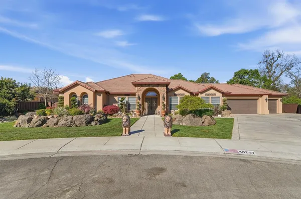front view of house with a yard