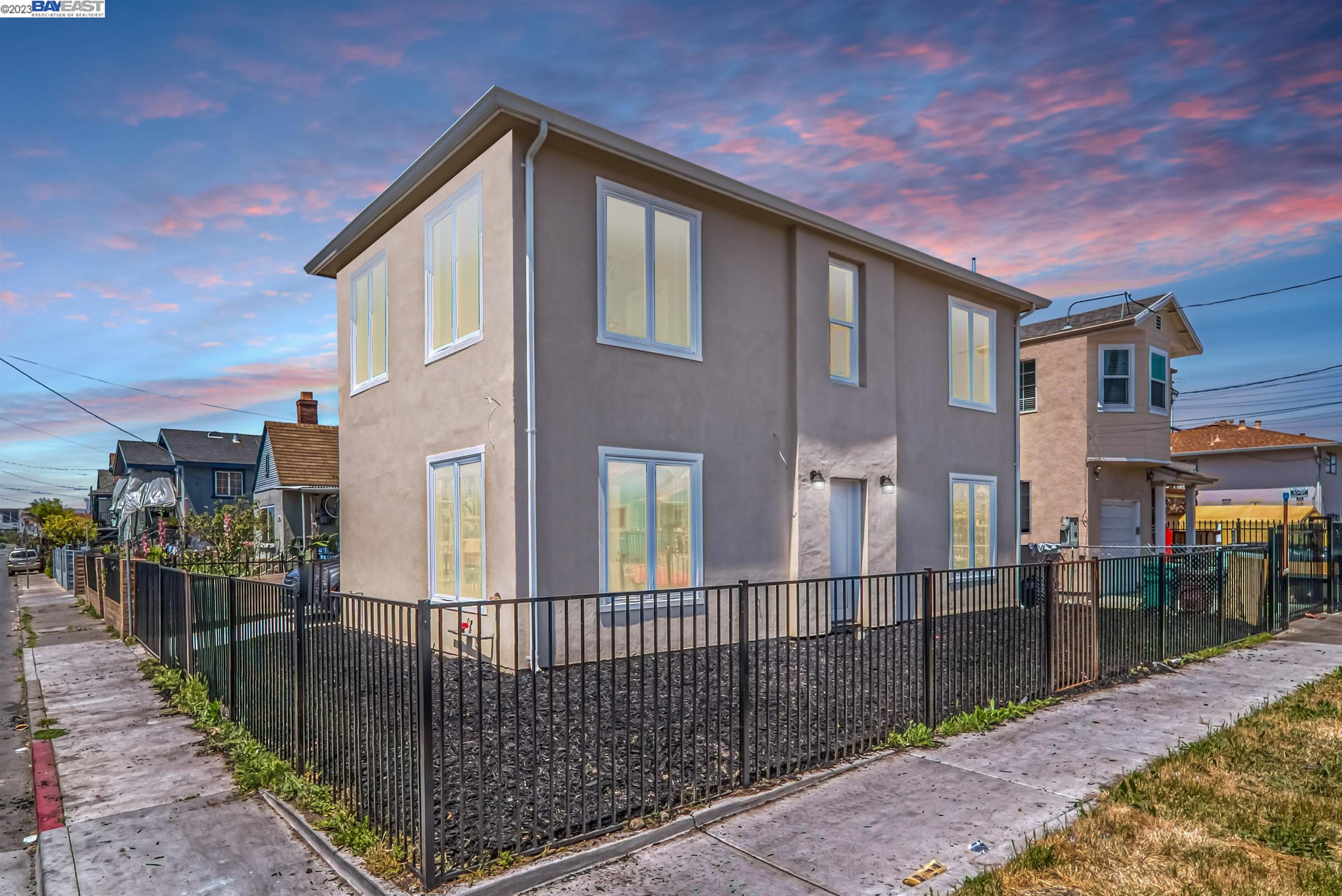 a front view of a house with parking area