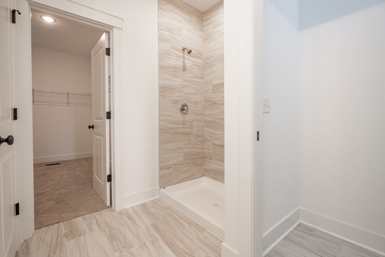 283 Wild Prairie Pointe Hampshire, IL 60140 - Photo 21 of 32 a bathroom with a bathtub